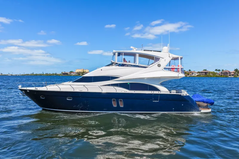 The Image of Luxury 2007 Marquis 59 Markham Edition yacht cruising on a sunny day. - 1