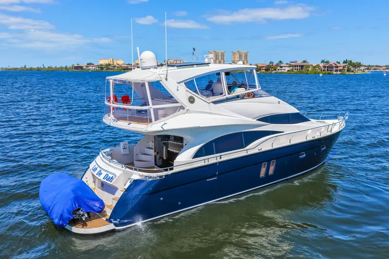 Slide: The Image of Luxury 2007 Marquis 59 Markham Edition yacht cruising on a sunny day. - 10