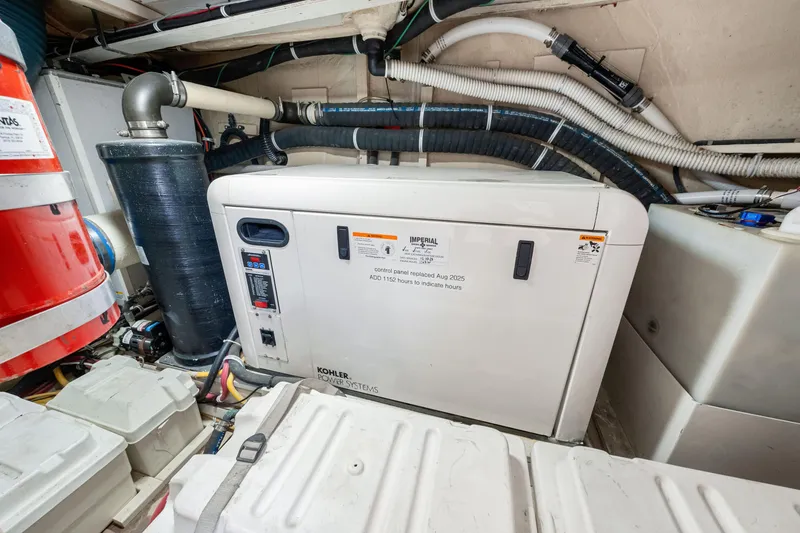 Slide: The Image of Engine room of 2007 Marquis 59 Markham Edition with Kohler power systems generator. - 105