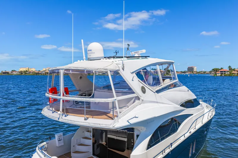 Slide: The Image of Luxurious 2007 Marquis 59 Markham Edition yacht cruising on a sunny day. - 15