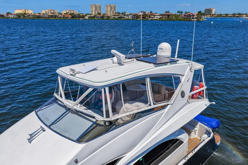 Slide: The Image of Luxury 2007 Marquis 59 Markham Edition yacht cruising on a sunny day. - 18