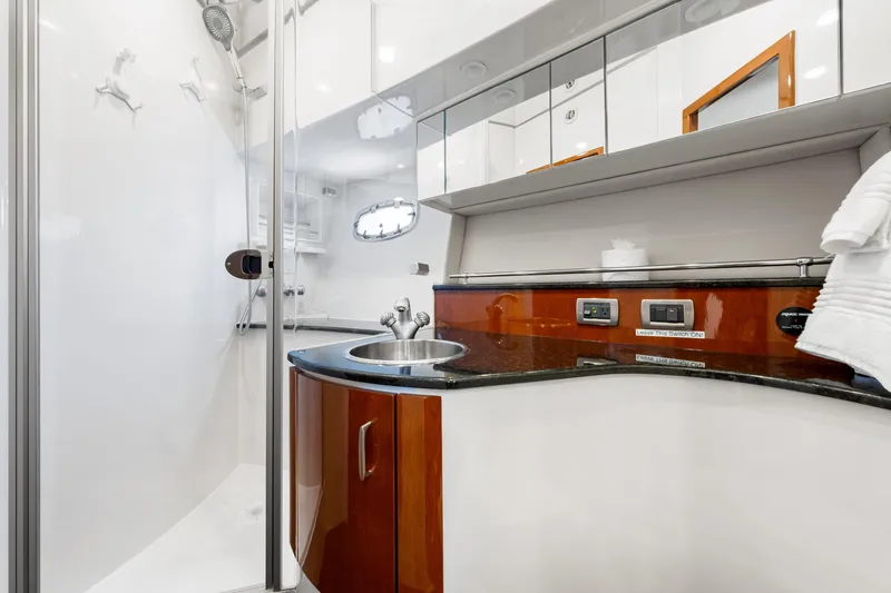 Slide: The Image of Luxurious bathroom in 2007 Marquis 59 Markham Edition yacht with modern fixtures and sleek design. - 194