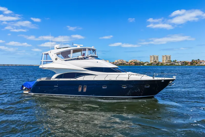 Slide: The Image of Luxurious 2007 Marquis 59 Markham Edition yacht cruising on a sunny day. - 22