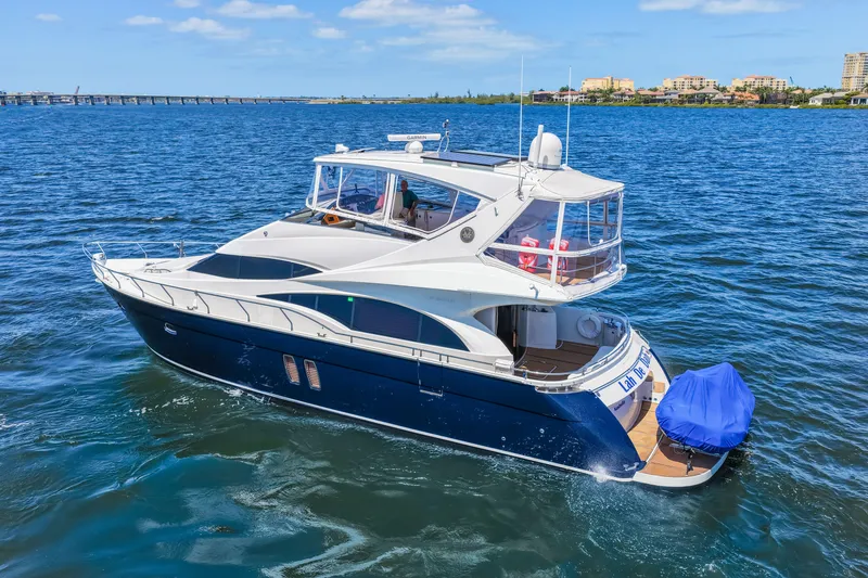 Slide: The Image of Luxurious 2007 Marquis 59 Markham Edition yacht cruising on a sunny day. - 26