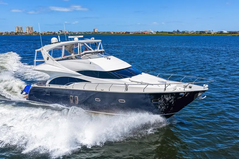 Slide: The Image of Luxury yacht Marquis 59 Markham Edition 2007 cruising on open water. - 30