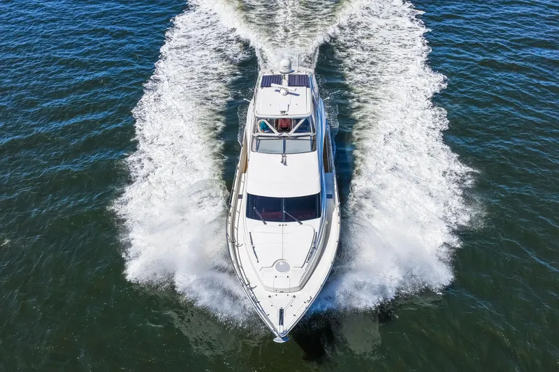 Slide: The Image of Luxury yacht Marquis 59 Markham Edition 2007 cruising on open water. - 35
