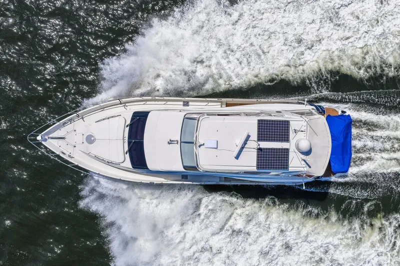 Slide: The Image of Aerial view of 2007 Marquis 59 Markham Edition yacht cruising on water. - 37