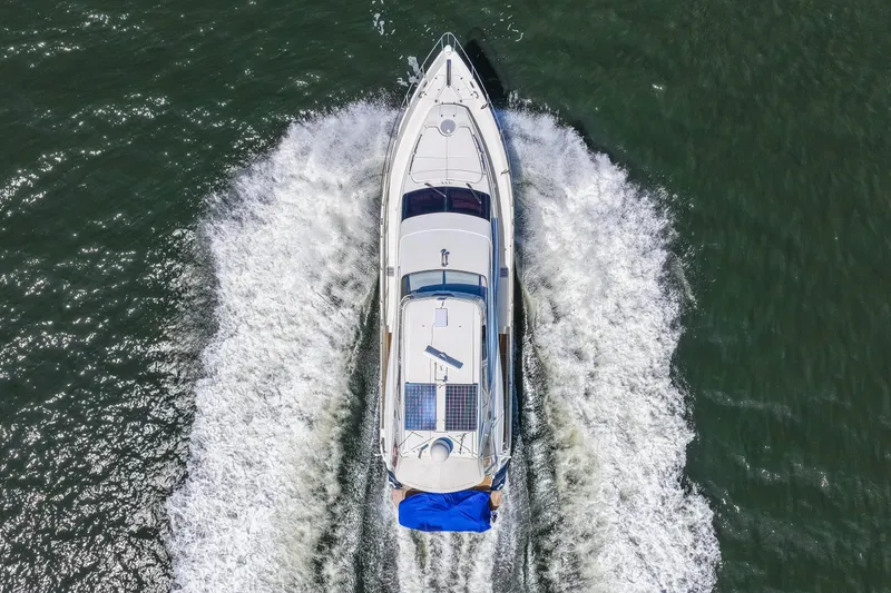 Slide: The Image of Aerial view of 2007 Marquis 59 Markham Edition yacht cruising on open water. - 38