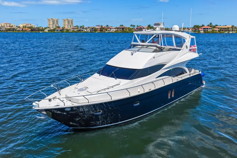 Slide: The Image of Luxurious 2007 Marquis 59 Markham Edition yacht cruising on a sunny day. - 4