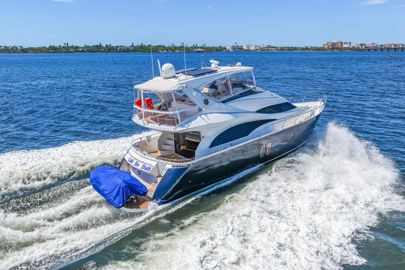 Slide: The Image of Luxurious 2007 Marquis 59 Markham Edition yacht cruising on open water. - 46