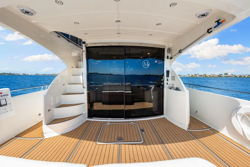 Slide: The Image of Luxurious 2007 Marquis 59 Markham Edition yacht interior with ocean view and elegant design. - 47