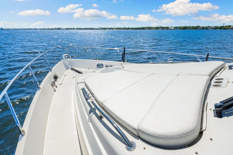 Slide: The Image of Luxury yacht deck of 2007 Marquis 59 Markham Edition on open water under blue sky. - 56