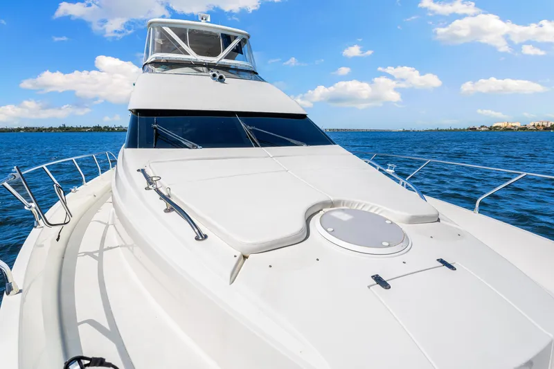 Slide: The Image of Luxury 2007 Marquis 59 Markham Edition yacht cruising on a sunny day. - 59