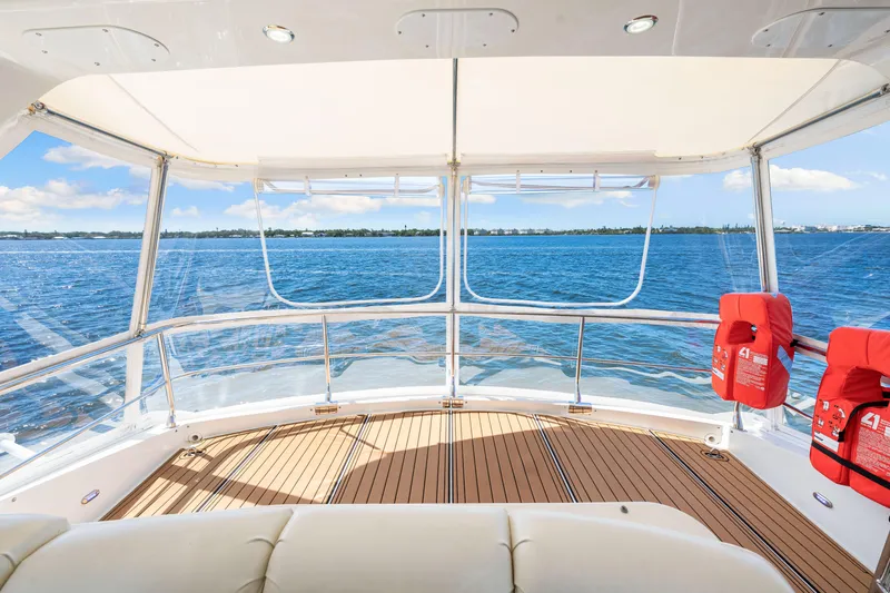 Slide: The Image of Luxurious 2007 Marquis 59 Markham Edition yacht interior with ocean view and life jackets. - 66