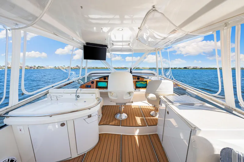 Slide: The Image of Luxurious 2007 Marquis 59 Markham Edition yacht interior with modern helm and ocean view. - 68