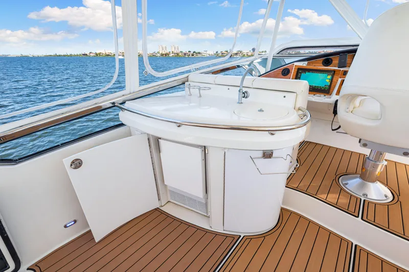Slide: The Image of Luxurious 2007 Marquis 59 Markham Edition yacht interior with elegant wood flooring and modern amenities. - 69