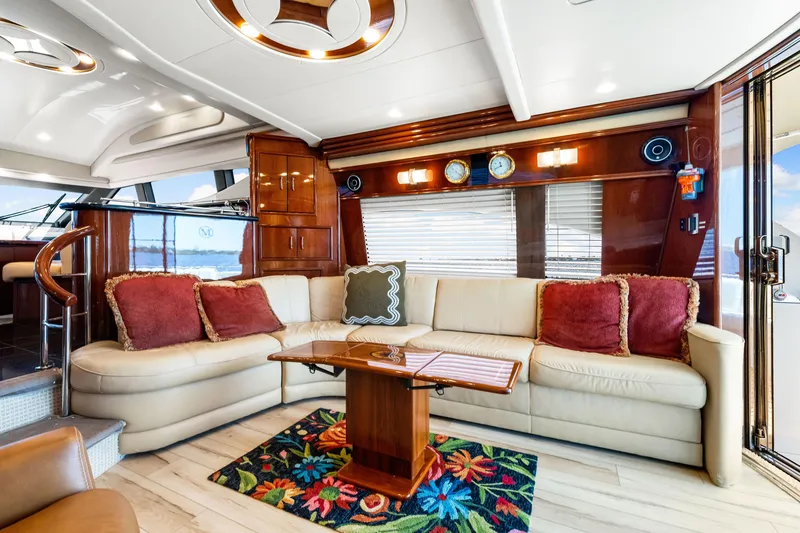Slide: The Image of Luxurious interior of 2007 Marquis 59 Markham Edition yacht with plush seating and elegant decor. - 78