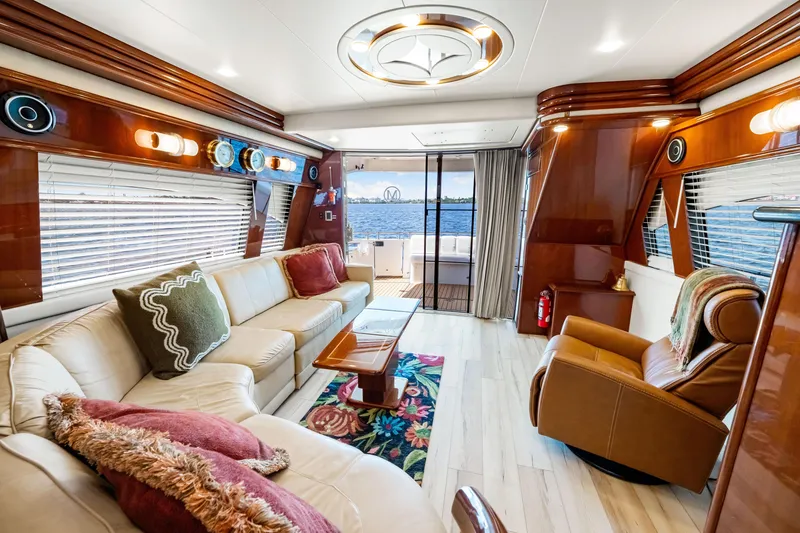 Slide: The Image of Luxurious interior of 2007 Marquis 59 Markham Edition yacht with elegant seating and scenic view. - 79