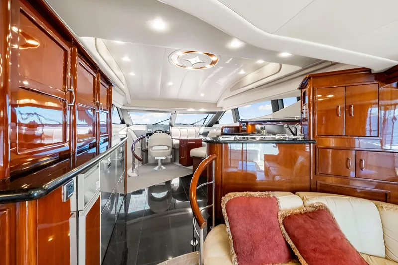 Slide: The Image of Luxurious interior of 2007 Marquis 59 Markham Edition yacht with polished wood finishes. - 81