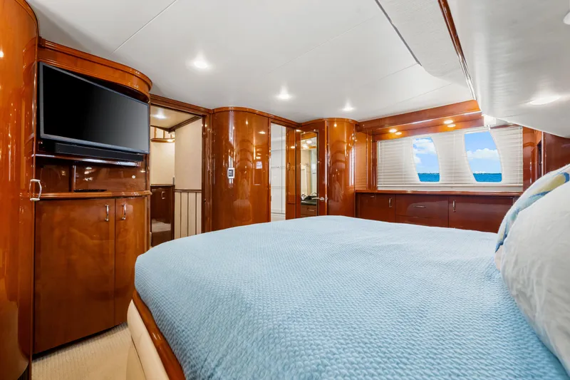 Slide: The Image of Luxurious 2007 Marquis 59 Markham Edition yacht bedroom with ocean view and modern amenities. - 94