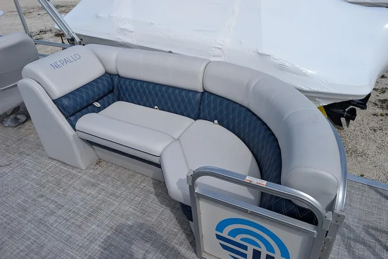 Slide: The Image of 2022 Nepallo 22QL boat seating with gray and blue upholstery, featuring a curved design. - 19
