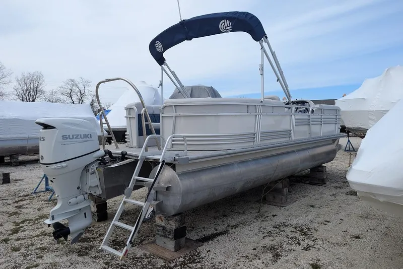 Slide: The Image of 2022 Nepallo 22QL pontoon boat with Suzuki outboard motor on dry dock. - 3