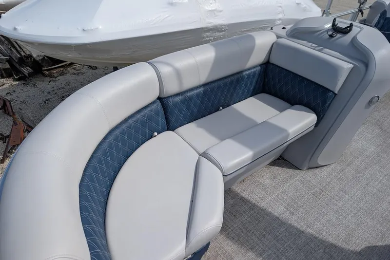 Slide: The Image of Luxurious seating on 2022 Nepallo 22QL boat with blue and gray upholstery. - 8