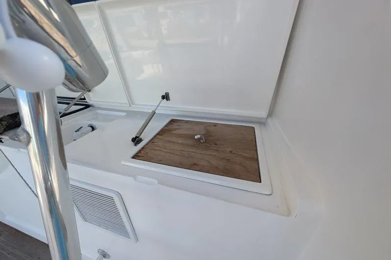 Slide: The Image of Open hatch on 2005 Egg Harbor 43 SportYacht, showcasing interior compartment details. - 101