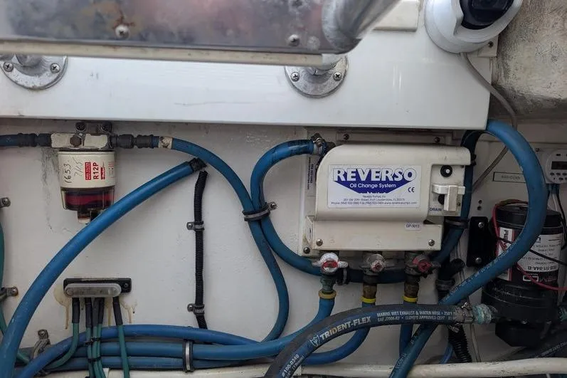 Slide: The Image of Engine room of a 2005 Egg Harbor 43 SportYacht with Reverso oil change system. - 109