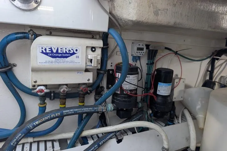 Slide: The Image of Engine room of 2005 Egg Harbor 43 SportYacht with Reverso oil change system. - 110