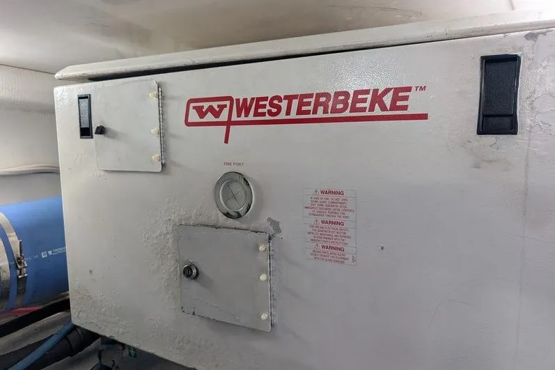 Slide: The Image of Westerbeke generator in 2005 Egg Harbor 43 SportYacht engine room. - 117