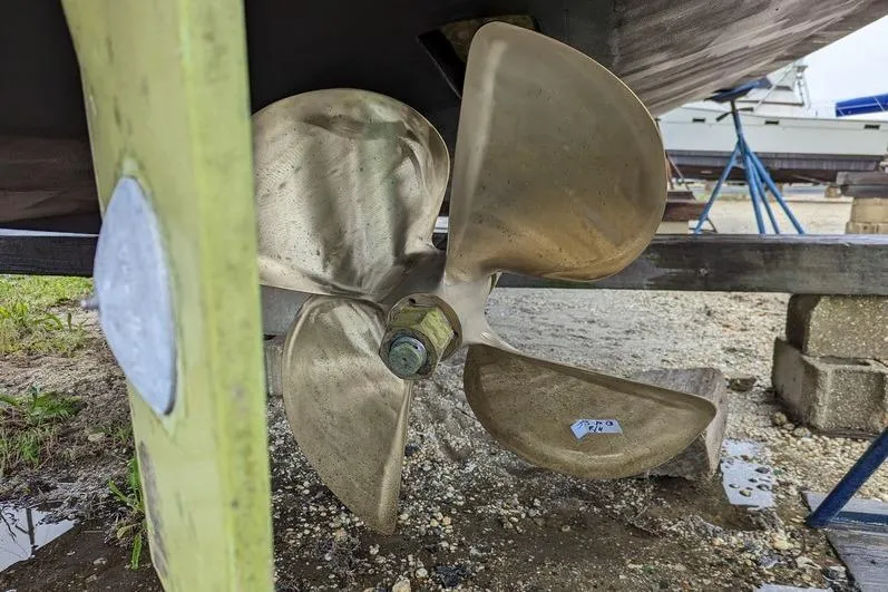 Slide: The Image of Propeller of 2005 Egg Harbor 43 SportYacht on dry dock, showcasing marine engineering. - 16