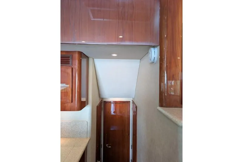 Slide: The Image of Interior view of 2005 Egg Harbor 43 SportYacht with polished wood finishes and recessed lighting. - 41