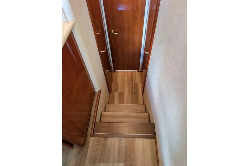 Slide: The Image of Staircase inside 2005 Egg Harbor 43 SportYacht with wooden finish and elegant design. - 42
