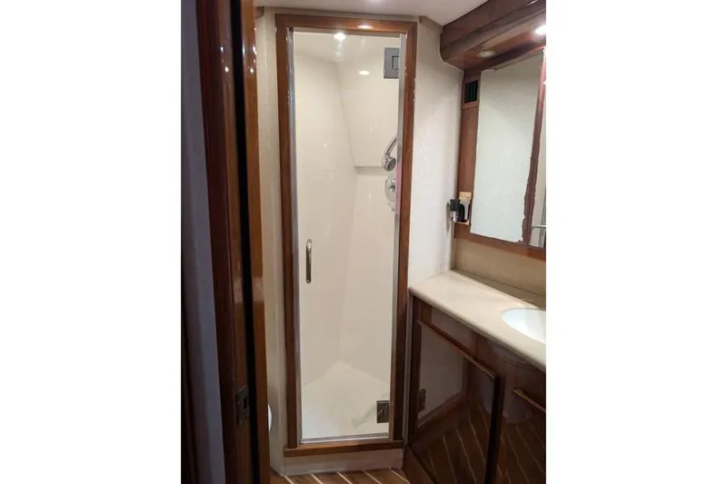 Slide: The Image of Bathroom interior of 2005 Egg Harbor 43 SportYacht with shower and vanity. - 43