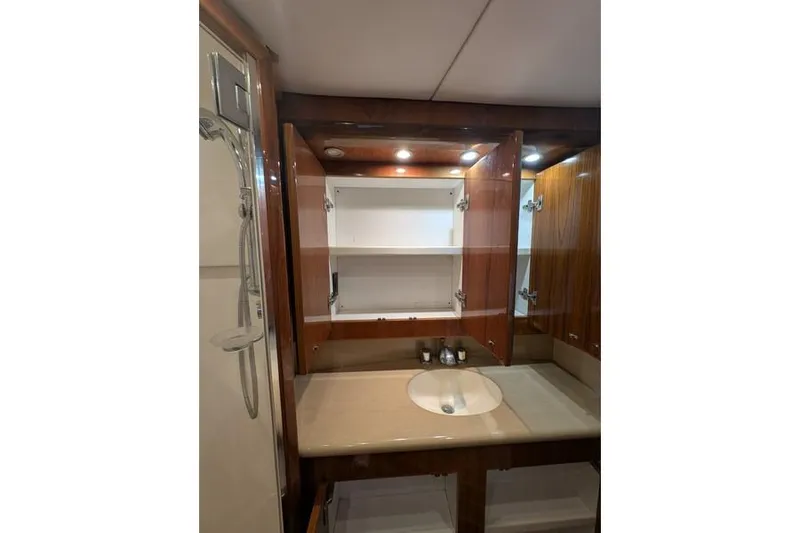 Slide: The Image of Bathroom vanity with open cabinets in 2005 Egg Harbor 43 SportYacht. - 51