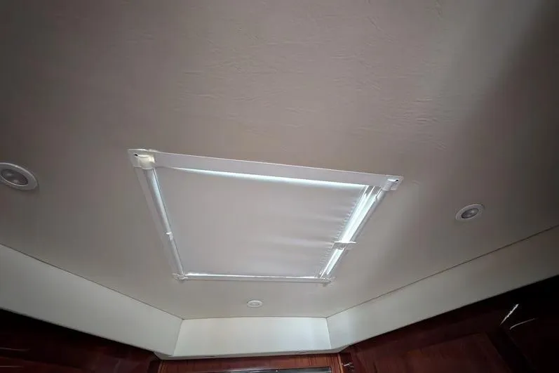 Slide: The Image of Ceiling view of 2005 Egg Harbor 43 SportYacht interior with recessed lighting and hatch. - 55