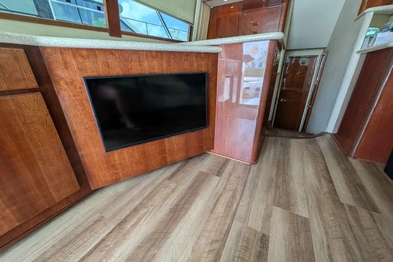 Slide: The Image of Interior of 2005 Egg Harbor 43 SportYacht with wood flooring and built-in TV. - 71