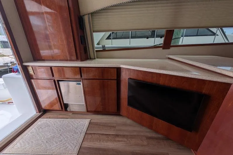 Slide: The Image of Interior of 2005 Egg Harbor 43 SportYacht with wooden cabinetry and countertop. - 72