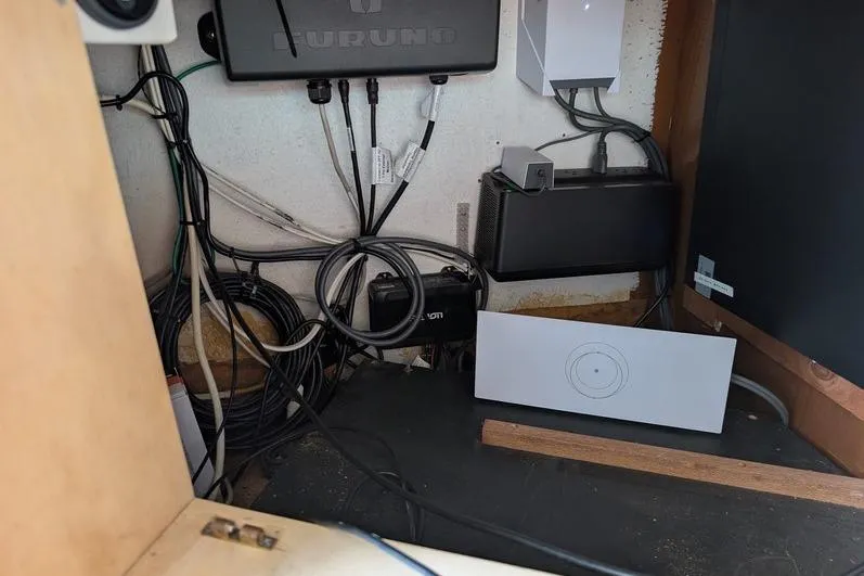 Slide: The Image of Electrical wiring and equipment inside a 2005 Egg Harbor 43 SportYacht. - 82