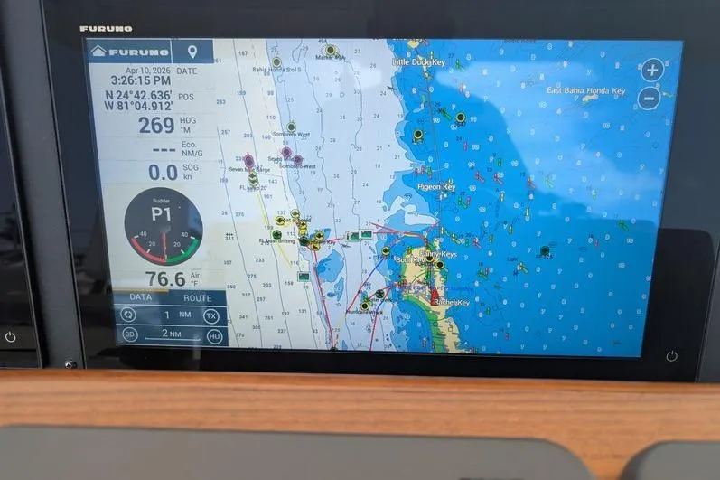 Slide: The Image of Navigation display on 2005 Egg Harbor 43 SportYacht showing nautical chart and coordinates. - 91