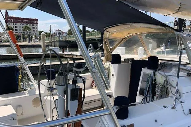 Slide: The Image of Sailboat cockpit of 1995 Freedom 35, docked in a marina. - 3