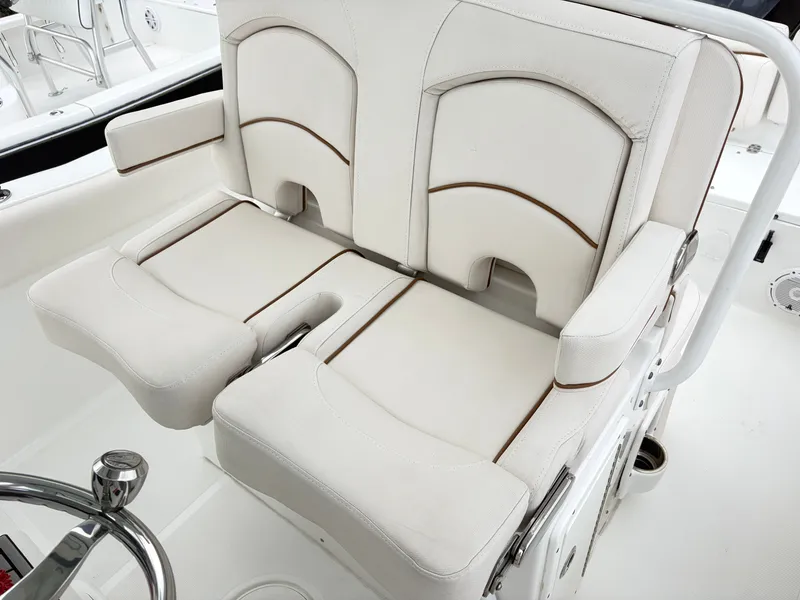Slide: The Image of 2021 Sea Hunt Ultra 239 SE boat seat in white. - 12