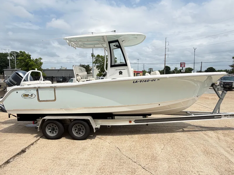 Slide: The Image of 2021 Sea Hunt Ultra 239 SE boat on trailer, side view. - 4
