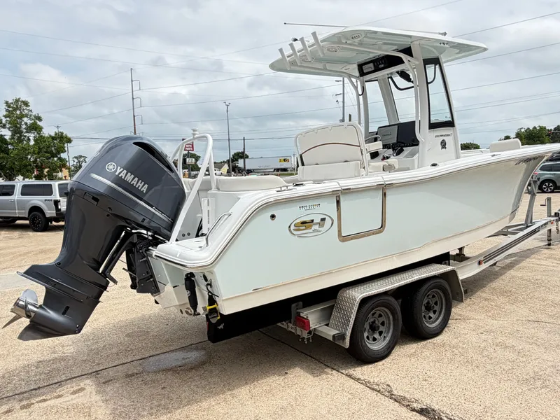 Slide: The Image of 2021 Sea Hunt Ultra 239 SE boat on trailer with Yamaha engine. - 5