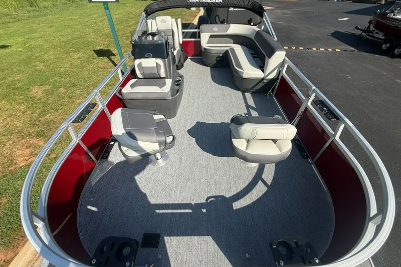 Slide: The Image of 2026 Sun Tracker Bass Buggy 16 XL Select pontoon boat with spacious seating and modern design. - 5