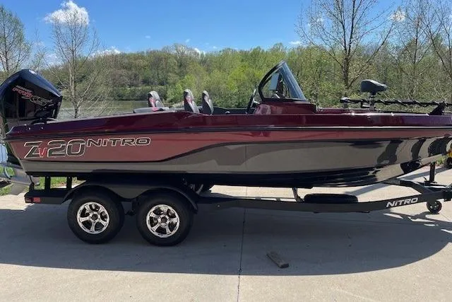 The Image of 2026 Nitro ZV20 Pro boat on trailer, parked outdoors. - 0