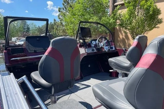 Slide: The Image of Interior of a 2026 Nitro ZV20 Pro boat with modern seating and dashboard. - 3