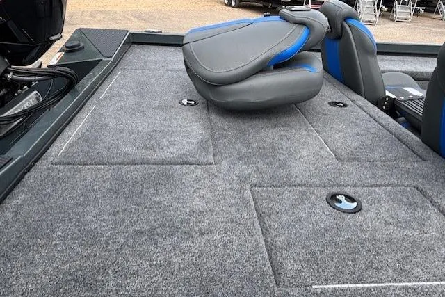 Slide: The Image of 2026 Ranger RT178C boat interior with gray carpet and adjustable seating. - 14