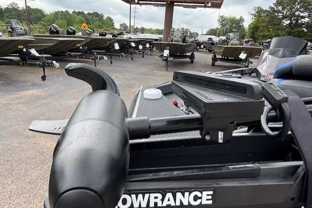 Slide: The Image of 2026 Ranger RT178C boat with Lowrance equipment, parked among other boats in a dealership lot. - 9